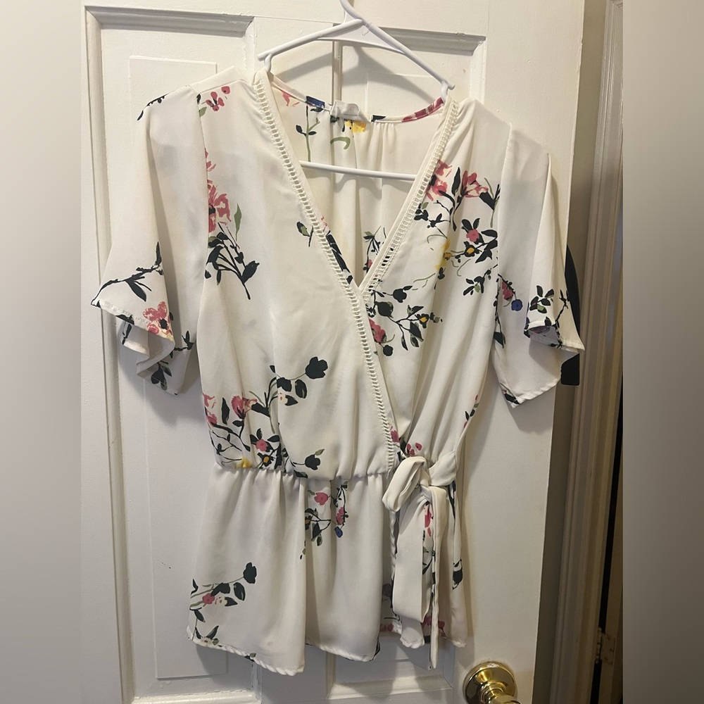 Floral top, ties on side. Size small